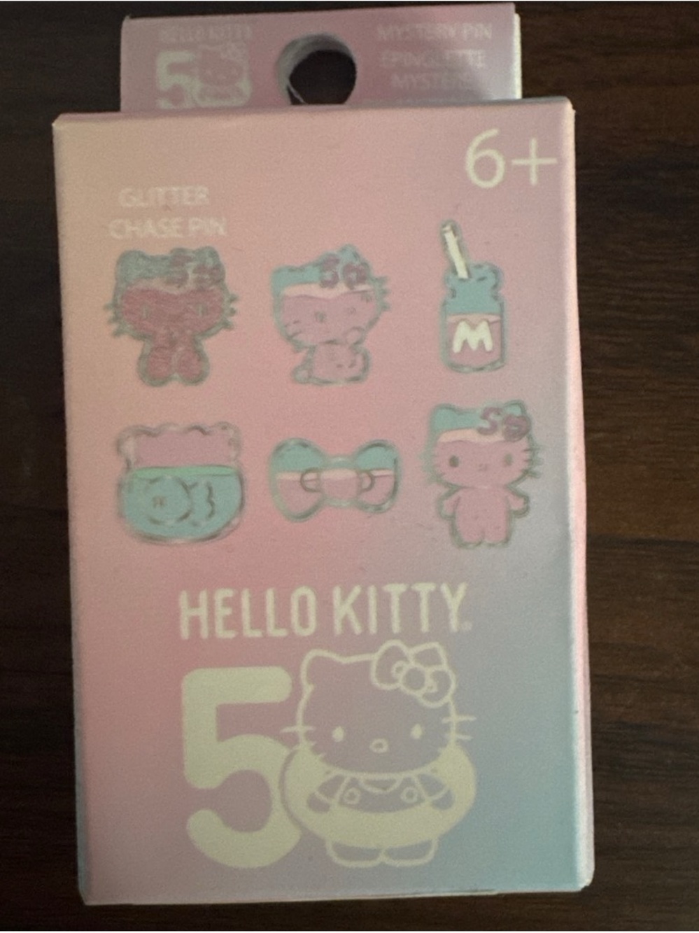 Hello Kitty 50th Anniversary Glitter Chaser Pin - Pink & Aqua Accents